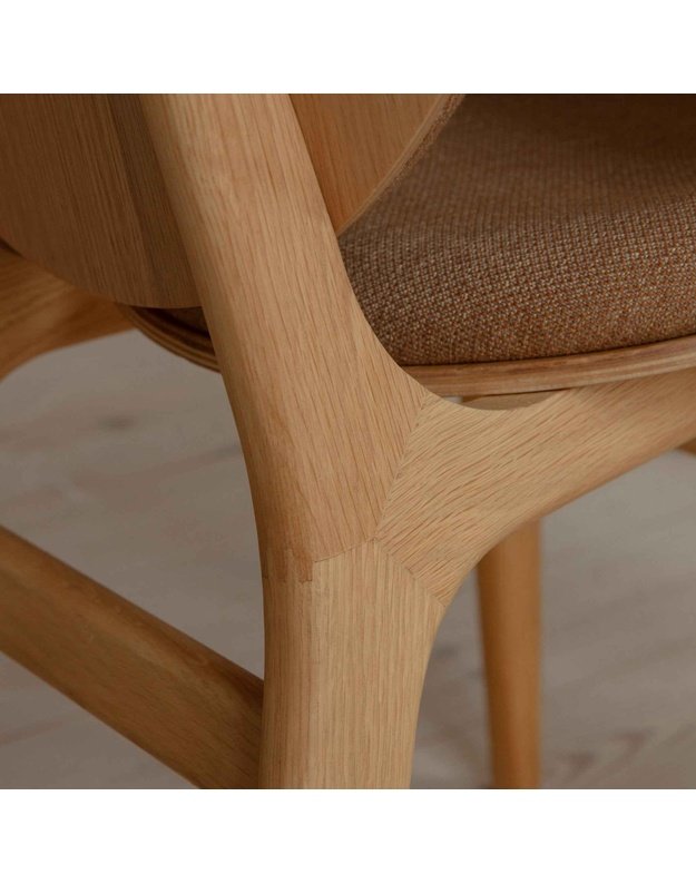 A CONVERSATION PIECE DINING CHAIR | Oak