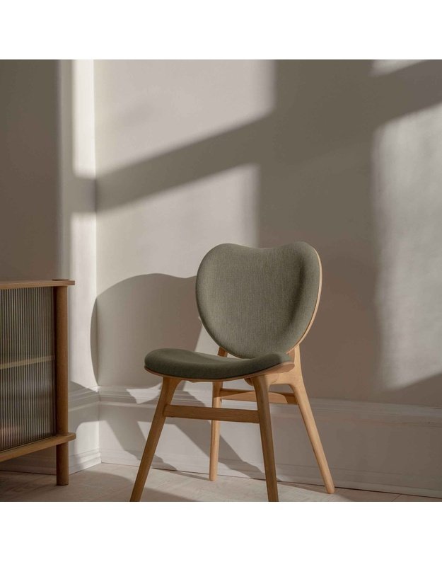 A CONVERSATION PIECE DINING CHAIR | Oak
