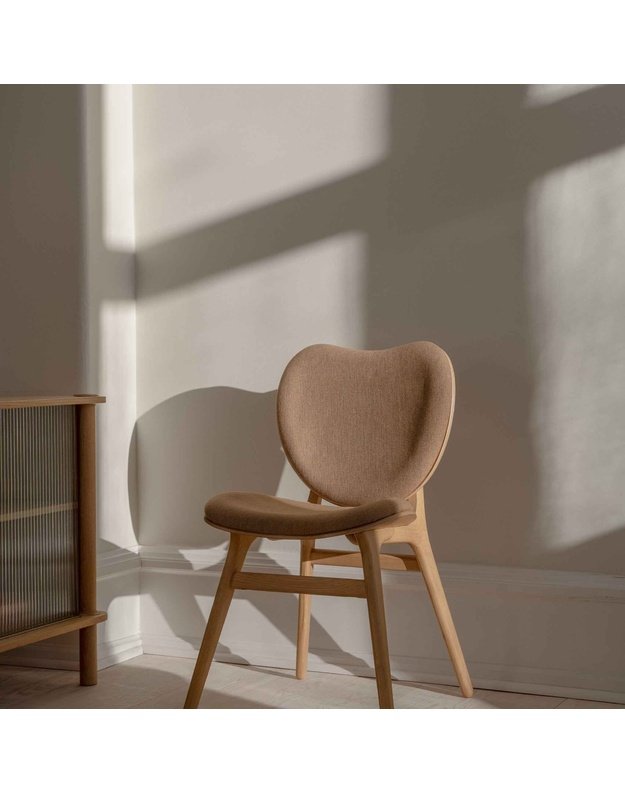 A CONVERSATION PIECE DINING CHAIR | Oak