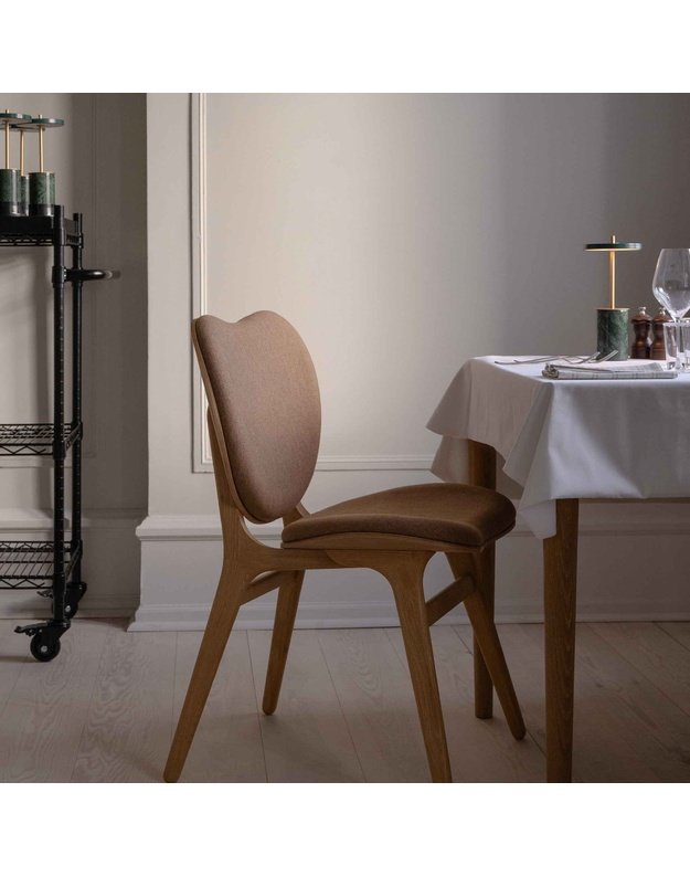 A CONVERSATION PIECE DINING CHAIR | Oak