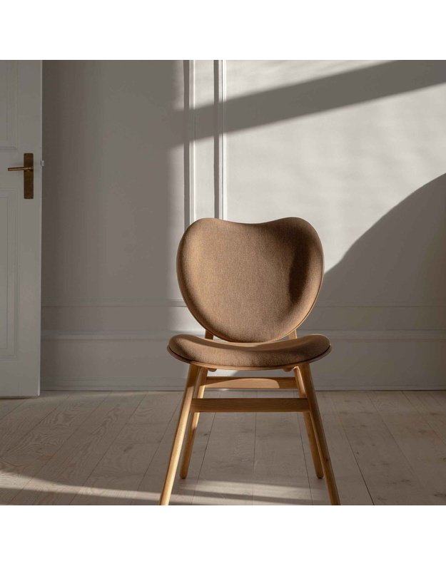 A CONVERSATION PIECE DINING CHAIR | Oak