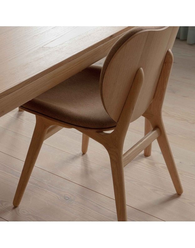 A CONVERSATION PIECE DINING CHAIR | Oak