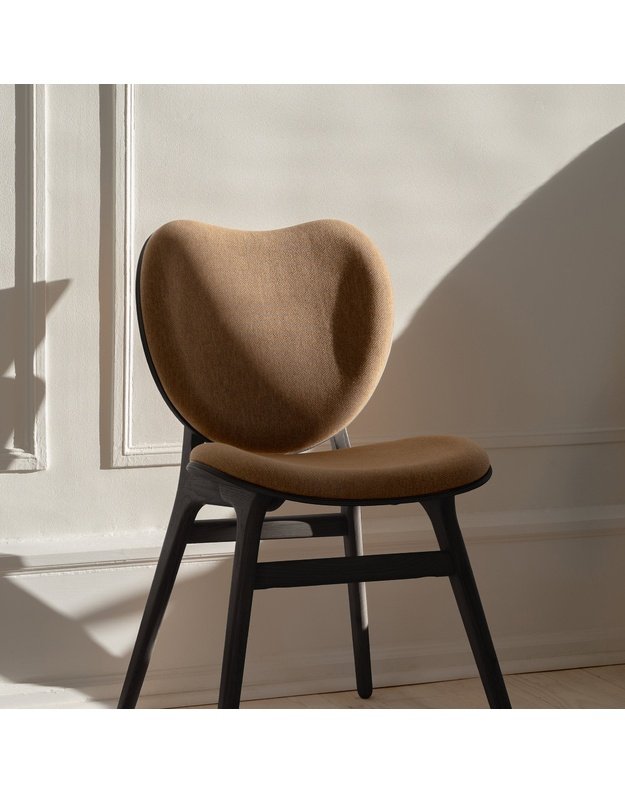 A CONVERSATION PIECE DINING CHAIR | Black Oak