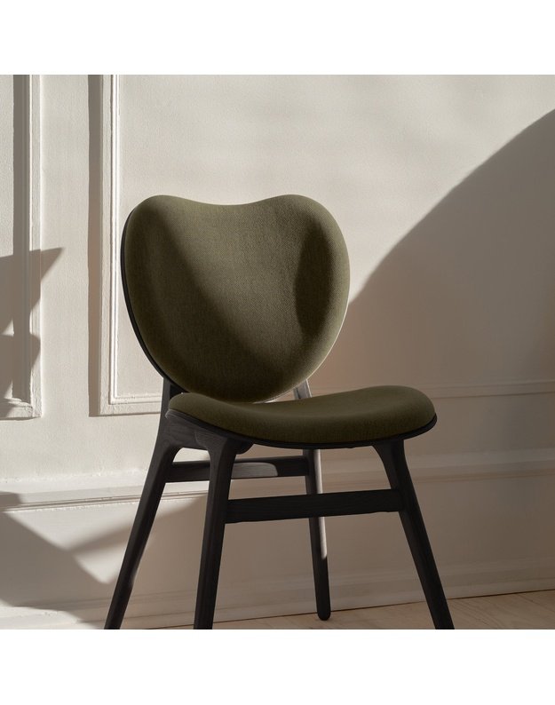 A CONVERSATION PIECE DINING CHAIR | Black Oak