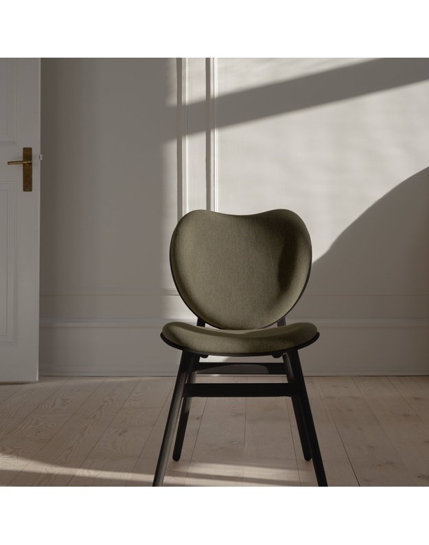 A CONVERSATION PIECE DINING CHAIR | Black Oak