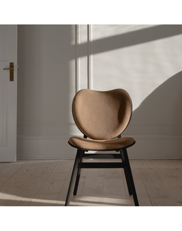 A CONVERSATION PIECE DINING CHAIR | Black Oak