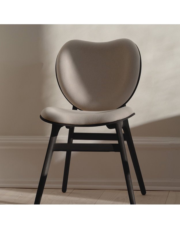 A CONVERSATION PIECE DINING CHAIR | Black Oak