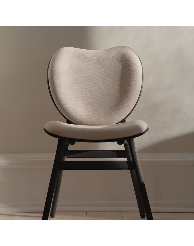A CONVERSATION PIECE DINING CHAIR | Black Oak