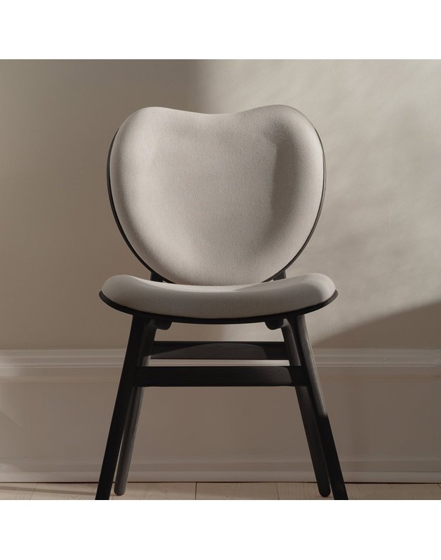 A CONVERSATION PIECE DINING CHAIR | Black Oak