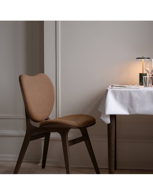 A CONVERSATION PIECE DINING CHAIR | Walnut