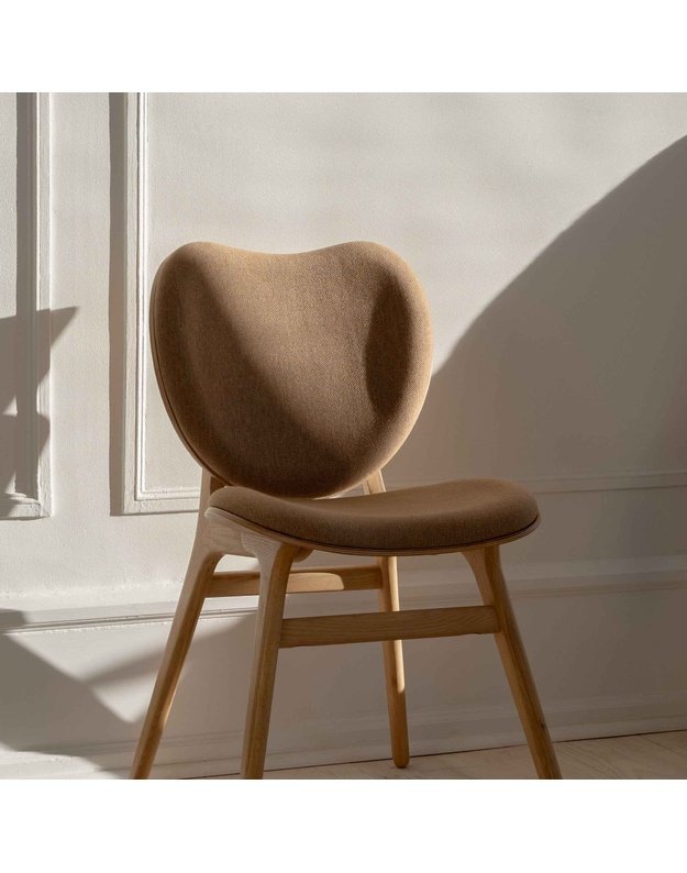 A CONVERSATION PIECE DINING CHAIR | Walnut