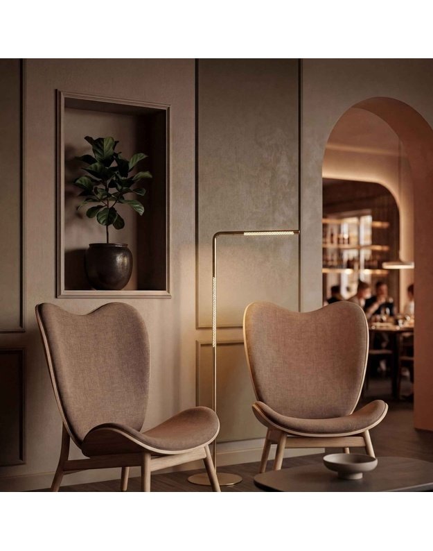 A CONVERSATION PIECE TALL LOUNGE CHAIR