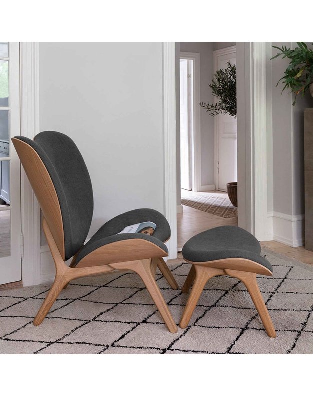 A CONVERSATION PIECE TALL LOUNGE CHAIR