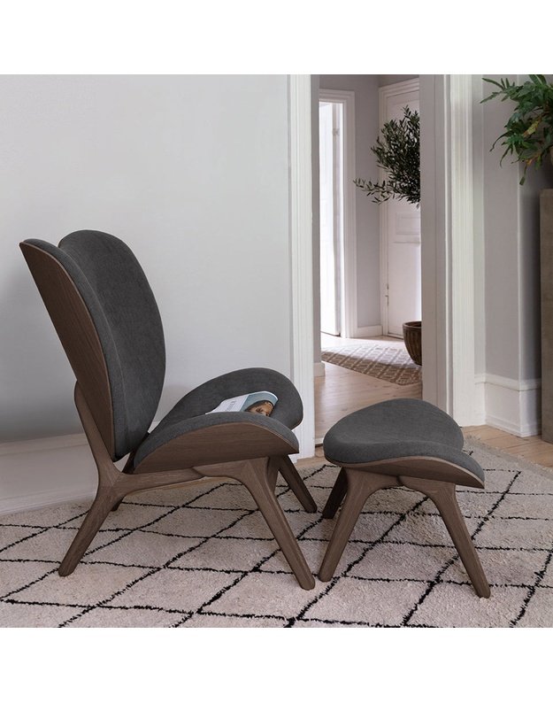 A CONVERSATION PIECE TALL LOUNGE CHAIR