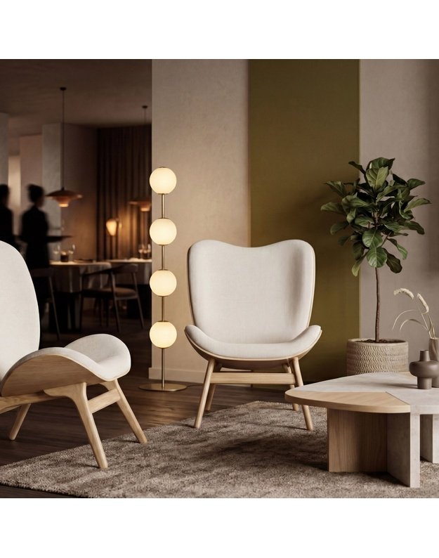 A CONVERSATION PIECE TALL LOUNGE CHAIR