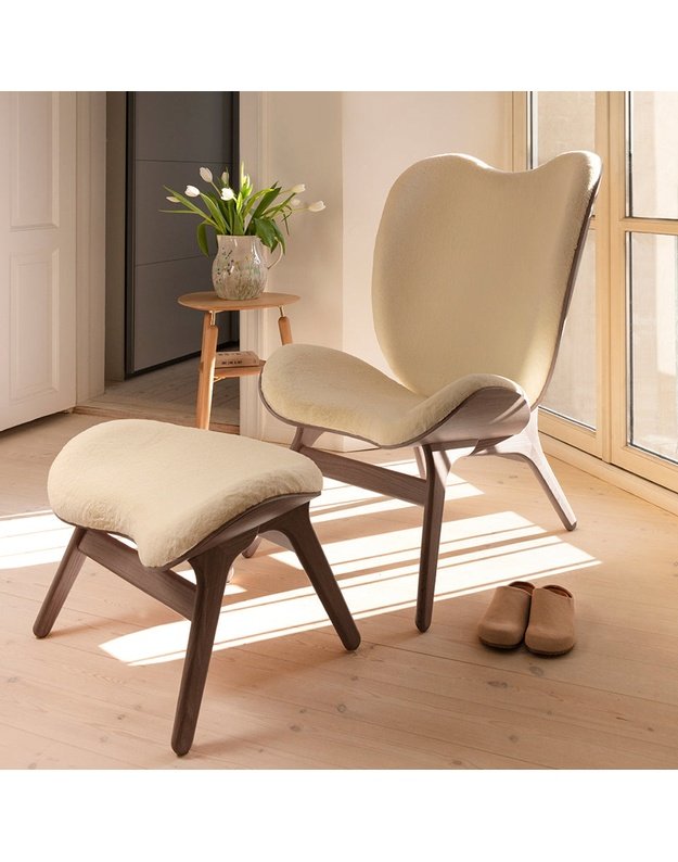 A CONVERSATION PIECE TALL LOUNGE CHAIR