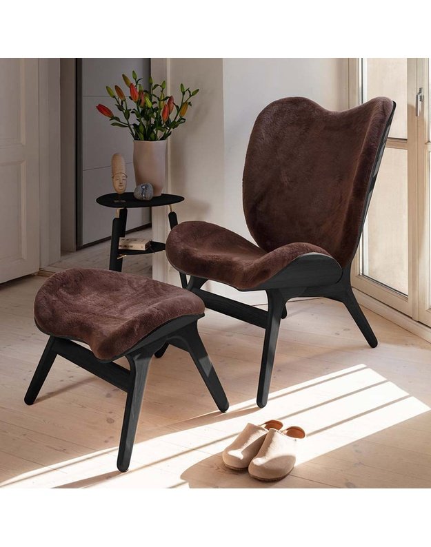 A CONVERSATION PIECE TALL LOUNGE CHAIR
